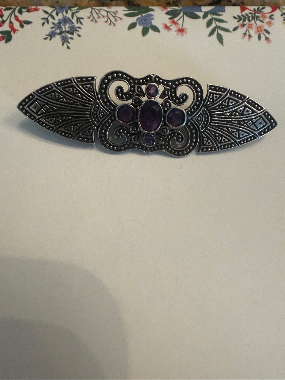 Ornate Silver 925 Brooch with Purple Gem Accent.  Marked 925 on back.